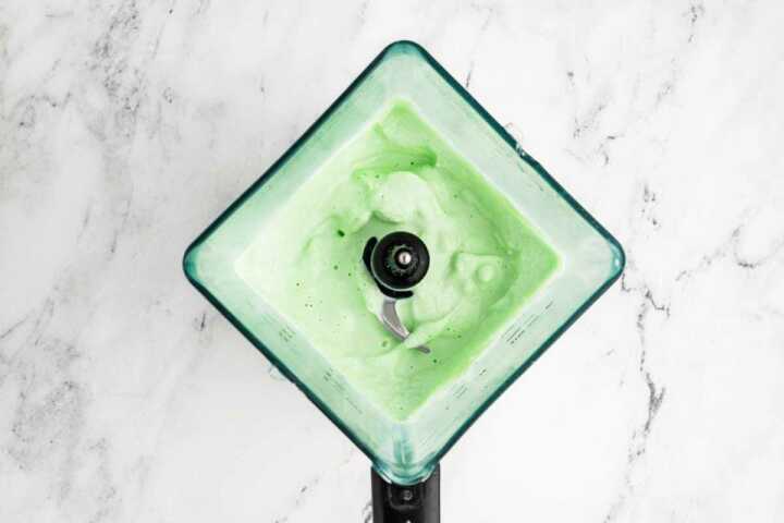 overhead view of blended shamrock shake in blender