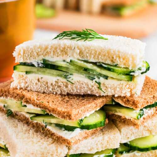 frontal view of stacked cucumber tea sandwiches