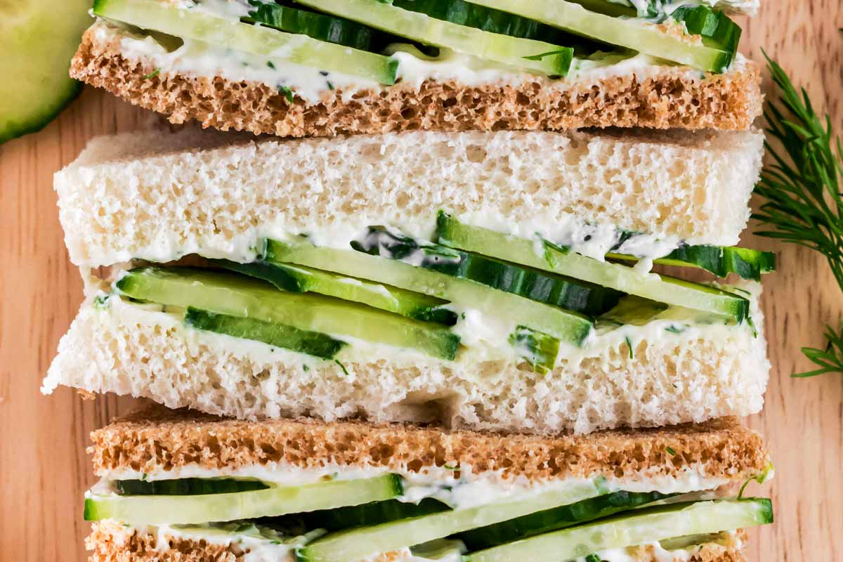 close up view of stacked cucumber tea sandwiches