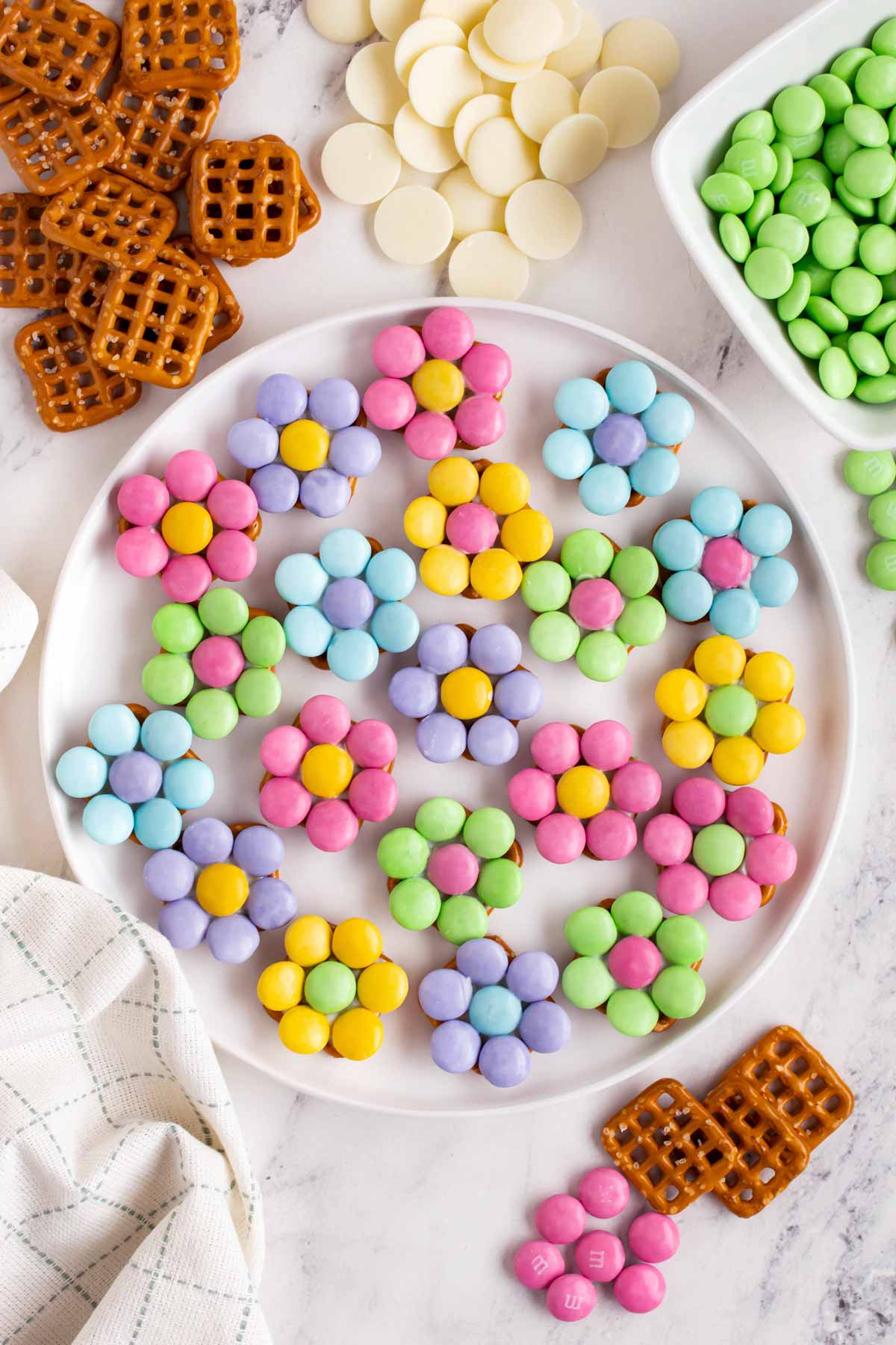 overhead view of flower pretzel bites on white plate