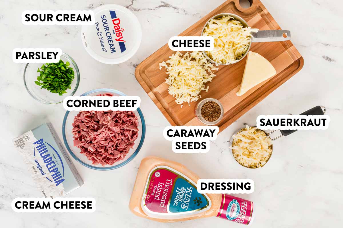 ingredients for hot reuben dip with text labels