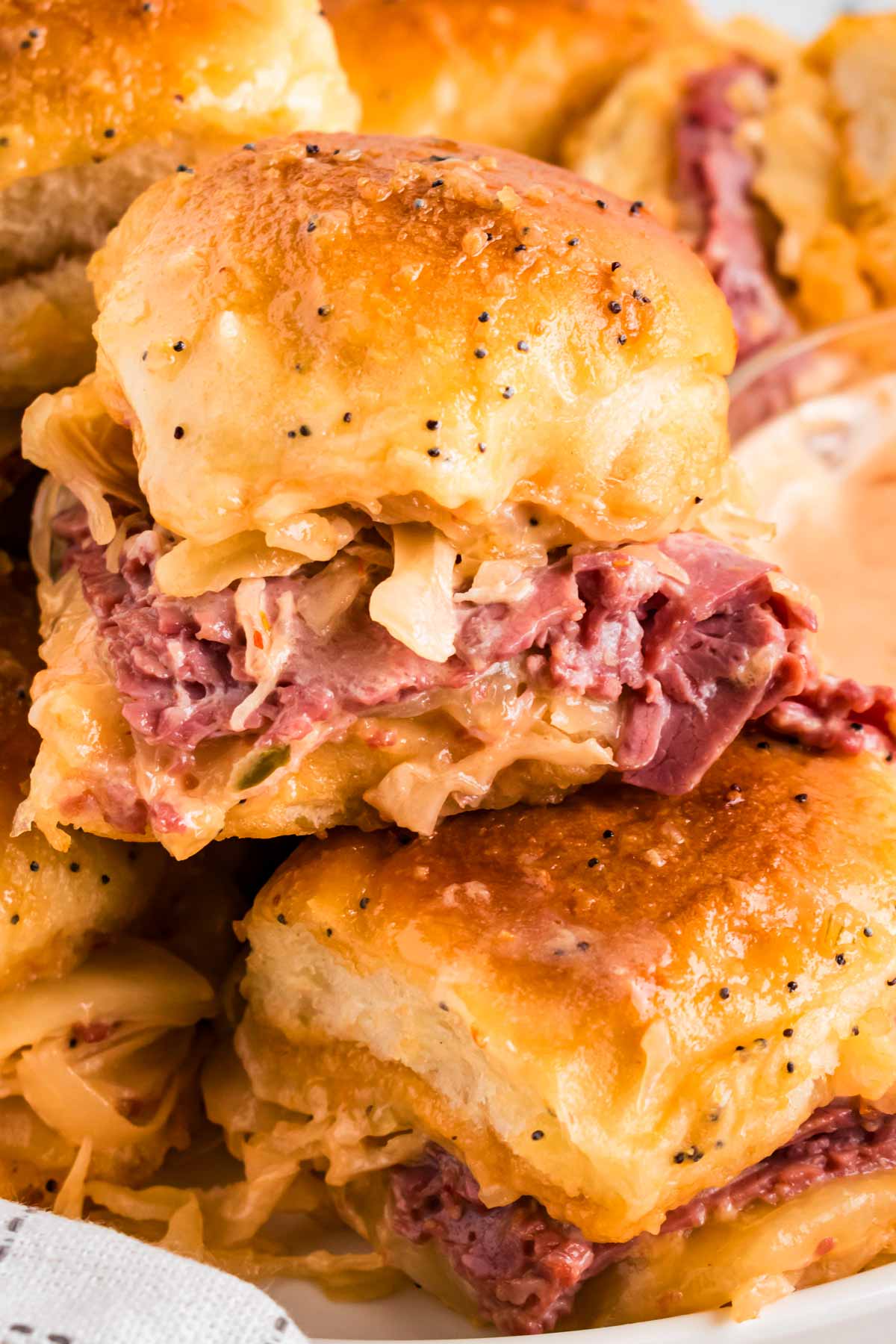 frontal view of stacked reuben sliders