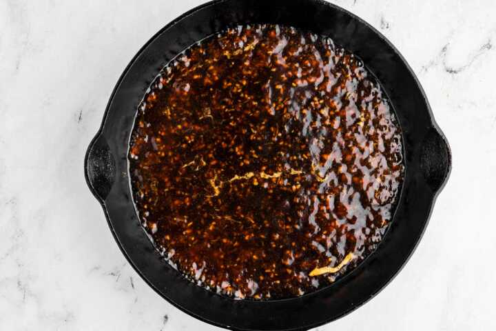 overhead view of teriyaki sauce in skillet