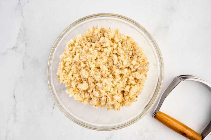 overhead view of streusel in glass bowl