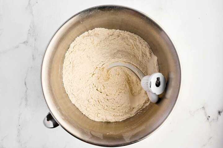 dry ingredients for potato rolls in mixer bowl